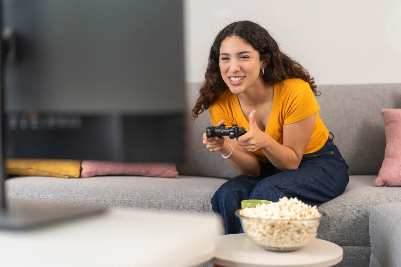 Teenage playing Xbox