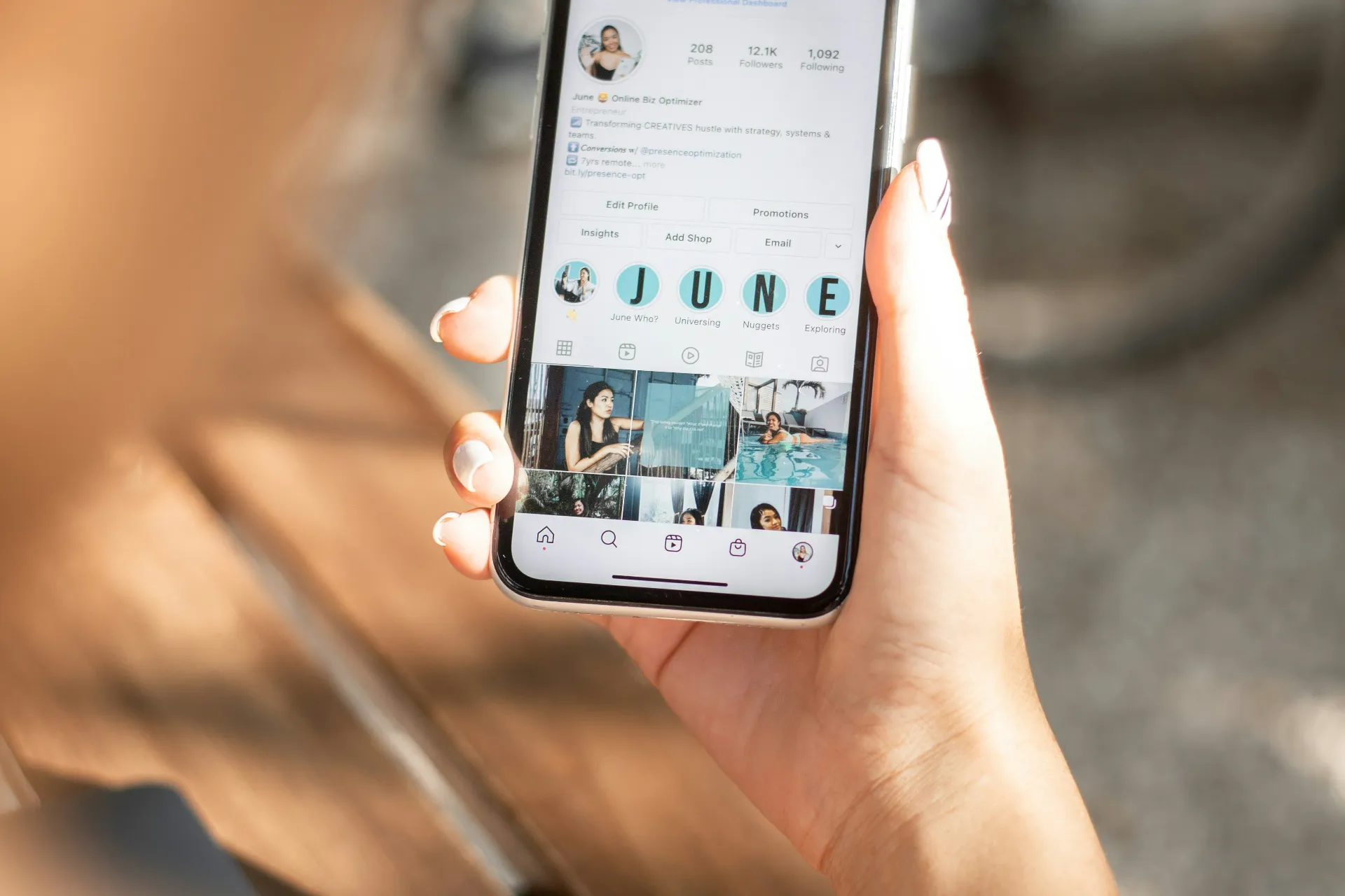 A person scrolling an Instagram profile on their phone